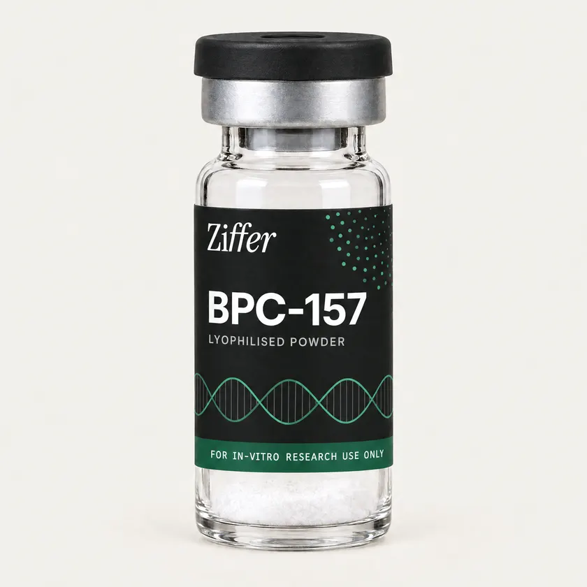 BPC-157 in a clear Ziffer glass vial with a black cap and a black label carrying a drawn green helix and a green band, holding white lyophilised powder.