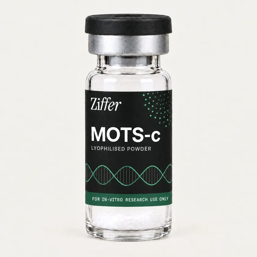 MOTS-c in a clear Ziffer glass vial with a black cap and a black label carrying a drawn green helix and a green band, holding white lyophilised powder.